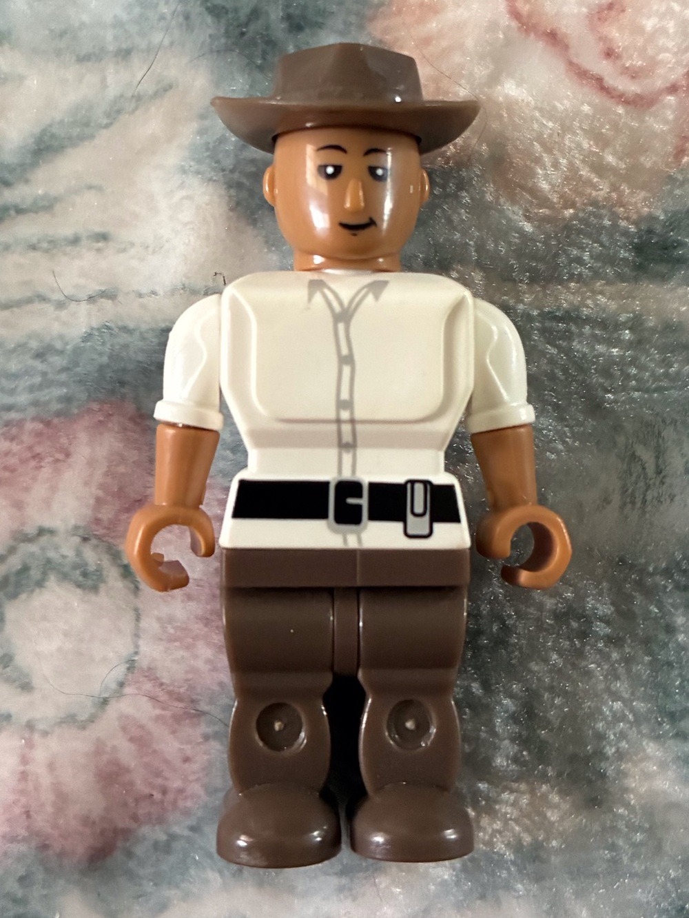 Brown and White Cowboy Figure Mini Toy
